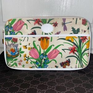 floral gucci clutch bag